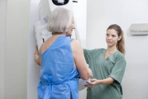 women getting mammogram