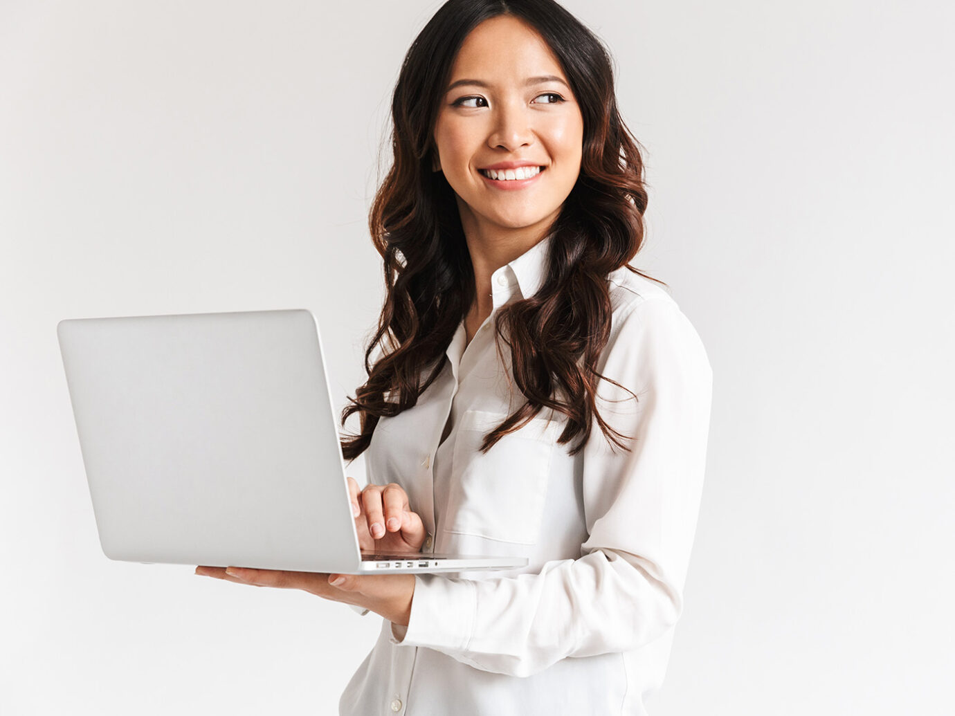 Woman holding her laptop