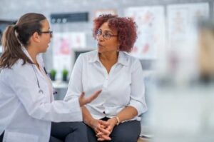 doctor talking to patient